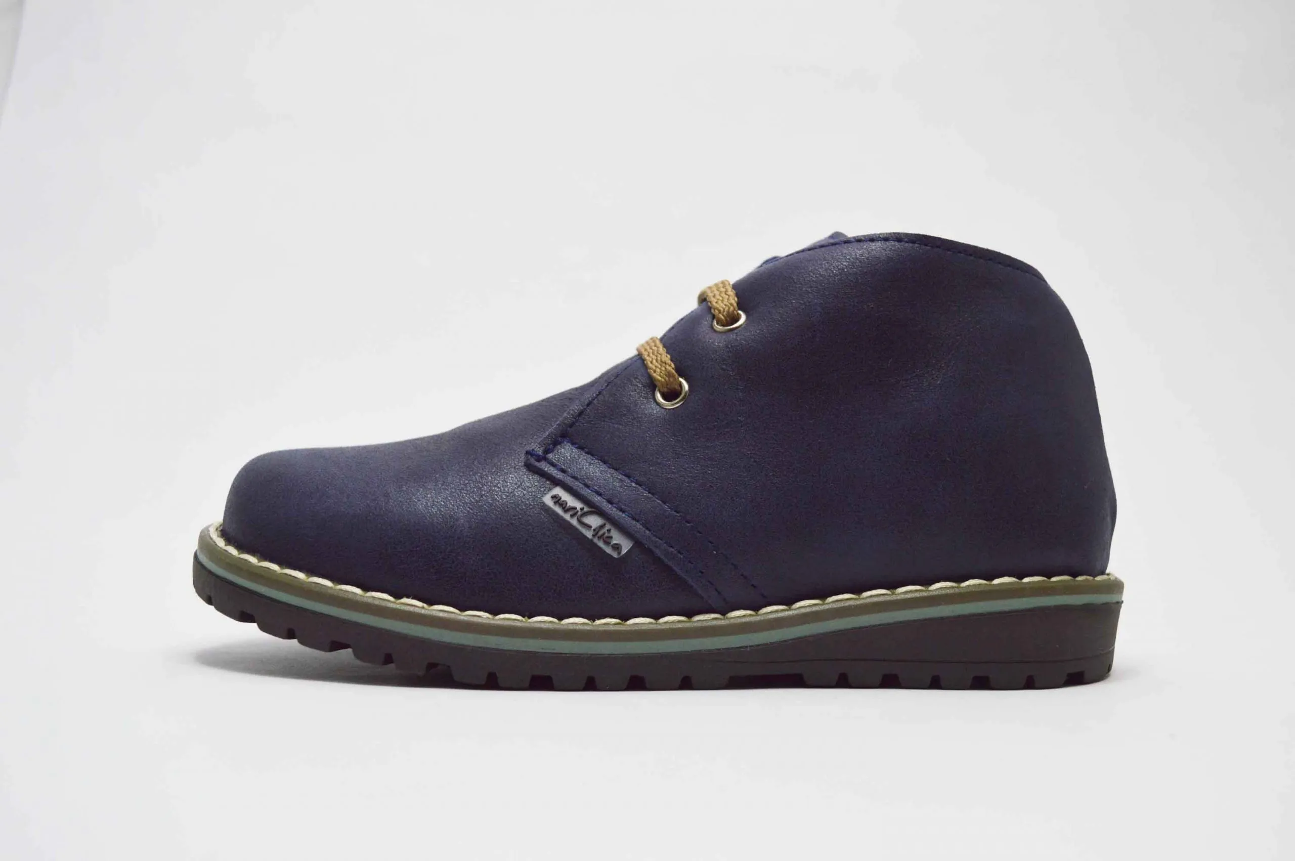 Bota tipo pisacacas cordones niños