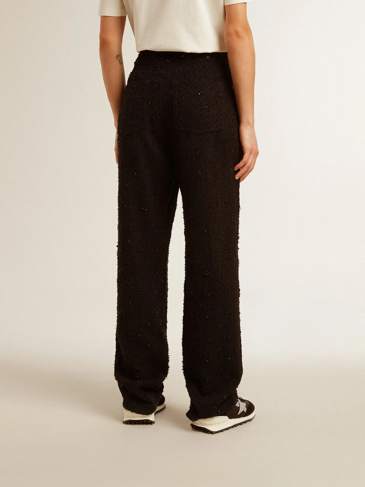Pantalón de mujer en denim de algodón con cristales y piedras aplicadas