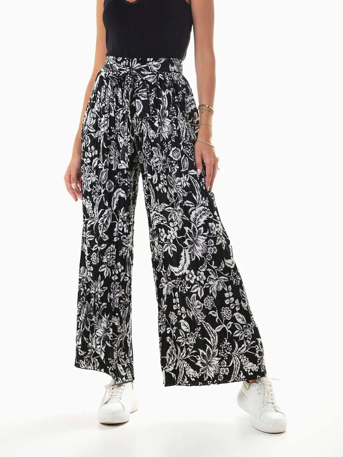 Pantalón fluido plisado tiro alto