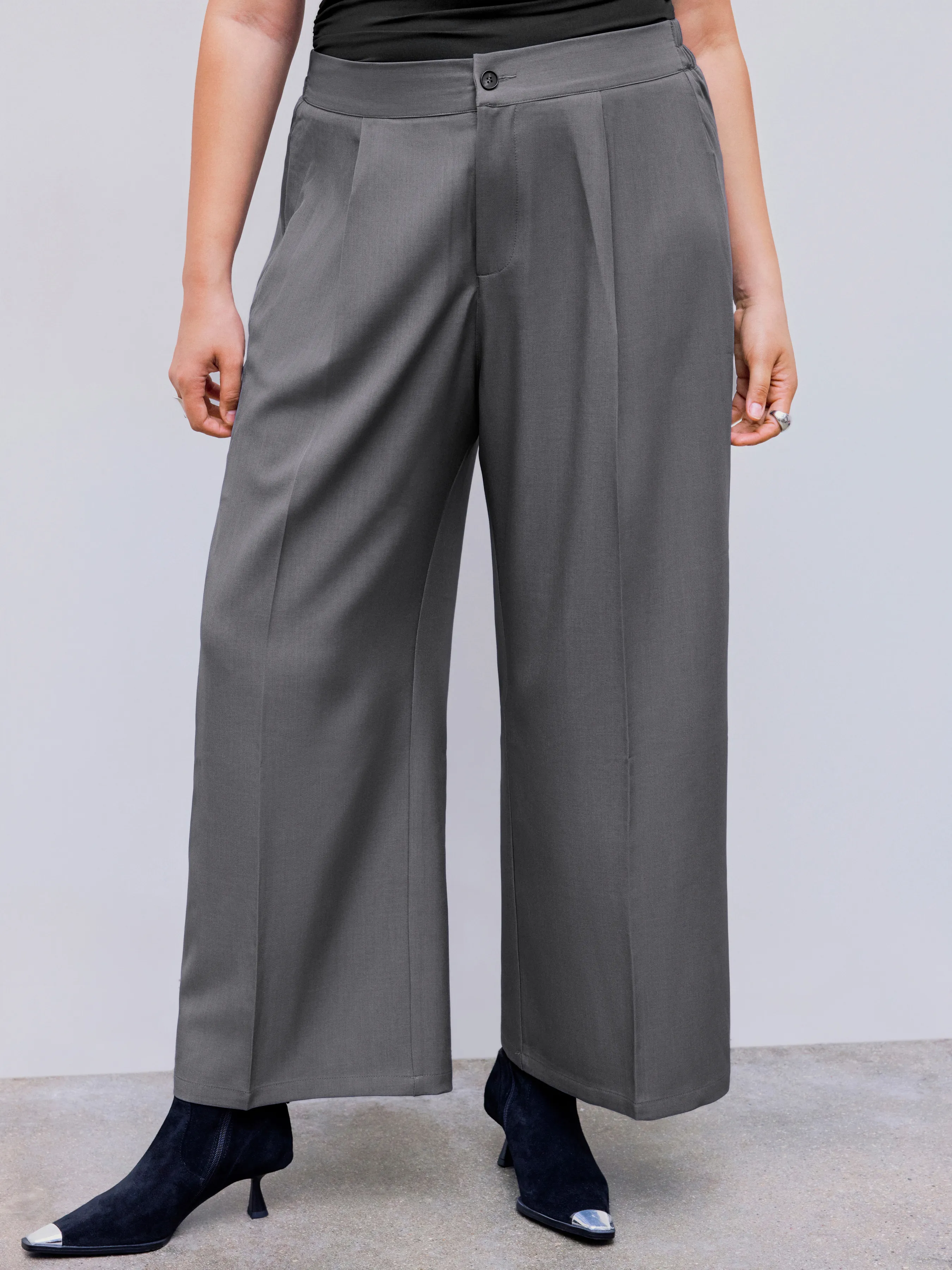 Pantalón tejido de tiro medio sólido con bolsillos y pliegues pierna recta Curvy