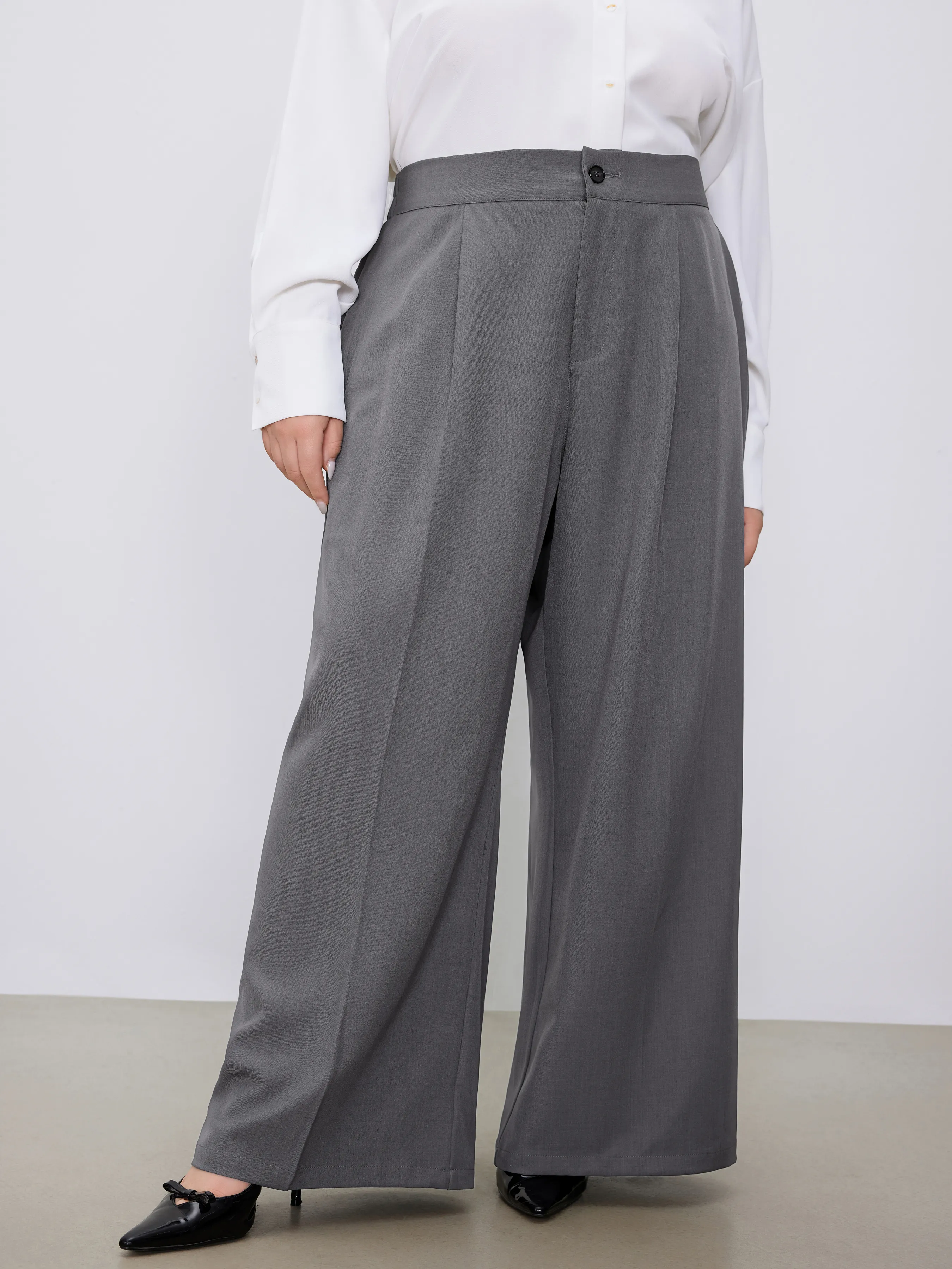 Pantalón tejido de tiro medio sólido con bolsillos y pliegues pierna recta Curvy