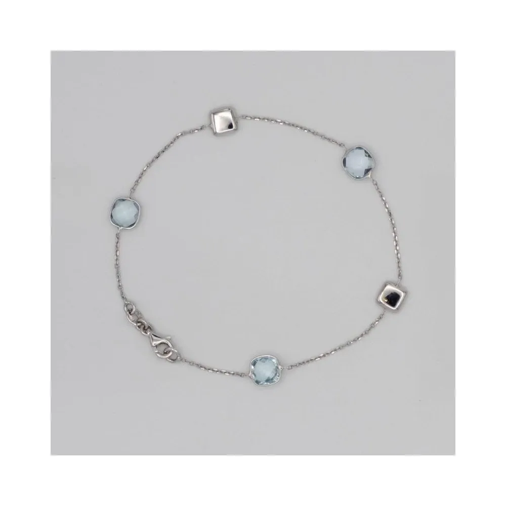 Pulsera oro blanco con piedras azul aguamarina
