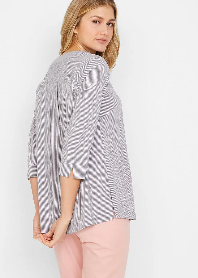 TúNICA EN TEJIDO DE BURBUJAS AZUL MARINOBLANCO CON RAYAS